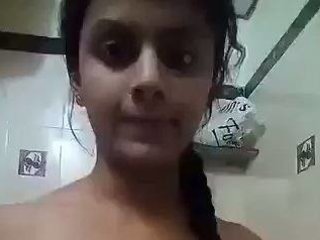 Indian guy uses pen and  playthings for