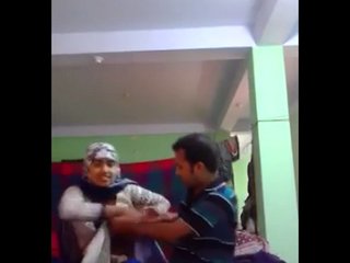 Pakistani doll in hijab gives a