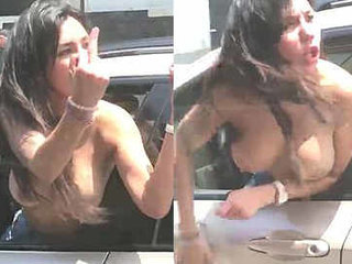 Insane damsel heads topless and screams