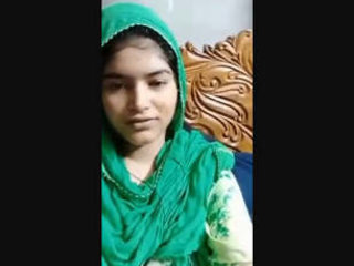A Muslim damsel showcases her massive