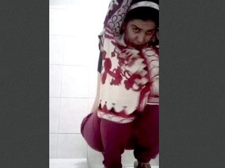 Pissing and playing in the rest room