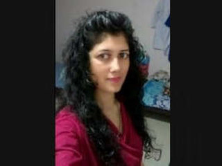 A Pakistani doll unsheathes her breasts