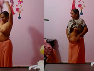 Middle-aged Indian aunt's outfit change