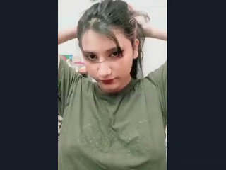Desi  flaunts her massive cleavage in
