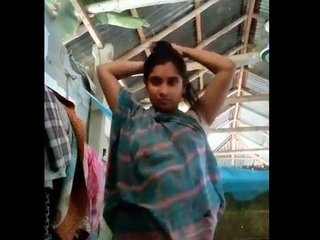 A naked Bengali woman engages in