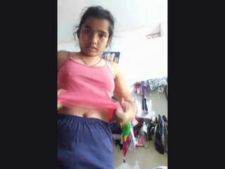 A youthfull Indian damsel takes a bare